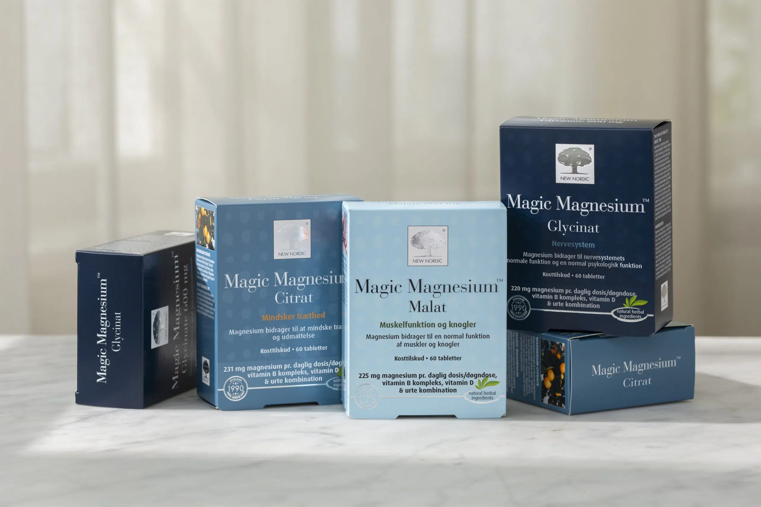 New Nordic Magic Magnesium™ Citrat, Malat ja Glycinat magneesiumilisandite sari sinistes pakendites.